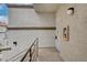 Close-up of a condo entrance featuring stucco exterior, and a secure front door at 3150 Soft Breezes Dr # 2046, Las Vegas, NV 89128