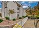 Charming condo featuring a landscaped walkway and steps, offering a welcoming approach to the building's entrance at 3150 Soft Breezes Dr # 2046, Las Vegas, NV 89128