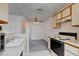 This kitchen has a breakfast bar area with a view into a large living space at 3150 Soft Breezes Dr # 2046, Las Vegas, NV 89128