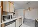 Functional kitchen featuring appliances, sink, and ample countertop space for cooking at 3150 Soft Breezes Dr # 2046, Las Vegas, NV 89128