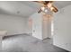 Spacious living area with a ceiling fan, multiple doorways, and neutral-colored walls at 3150 Soft Breezes Dr # 2046, Las Vegas, NV 89128