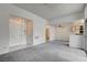 Spacious living room leading to the kitchen and bathroom, offering functionality and easy access at 3150 Soft Breezes Dr # 2046, Las Vegas, NV 89128