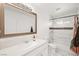 Bright bathroom featuring a large mirror, tiled shower/tub, and modern fixtures at 3208 Alcoa Ave, Las Vegas, NV 89102