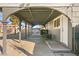 A covered carport with arched supports and ample space for parking or outdoor use at 3208 Alcoa Ave, Las Vegas, NV 89102