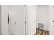 White hallway with a door open and white doors for storage at 3208 Alcoa Ave, Las Vegas, NV 89102