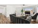 Bright living room features a ceiling fan, large window, neutral paint, and comfortable seating at 3208 Alcoa Ave, Las Vegas, NV 89102