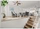 Bright and spacious living room with wood-look floors, and railing at 3208 Alcoa Ave, Las Vegas, NV 89102