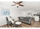 Bright living room showcases modern grey sofa, chair, and stylish décor at 3208 Alcoa Ave, Las Vegas, NV 89102