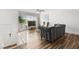 Bright and spacious living room with wood-look floors, and a ceiling fan at 3208 Alcoa Ave, Las Vegas, NV 89102