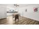 Large recreation room with modern kitchen, foosball table, and laminate flooring at 3208 Alcoa Ave, Las Vegas, NV 89102