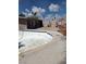 Backyard pool featuring tile border, mature trees, and patio area at 3314 Arapaho, Las Vegas, NV 89169