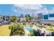 Inviting community pool with city views, lounge seating and mature landscape perfect for relaxation and entertainment at 3930 University Center Dr # 311, Las Vegas, NV 89119
