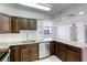 Contemporary kitchen featuring stainless steel appliances and granite countertops at 3930 University Center Dr # 311, Las Vegas, NV 89119