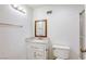 Neutral bathroom featuring a vanity, mirror, towel bar, toilet, and walk-in shower at 3930 University Center Dr # 312, Las Vegas, NV 89119