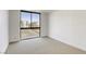 Bright bedroom with a large window at 3930 University Center Dr # 312, Las Vegas, NV 89119