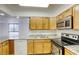 Bright kitchen featuring stainless steel appliances and granite countertops at 3930 University Center Dr # 312, Las Vegas, NV 89119