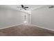 Bedroom featuring a ceiling fan, carpet floors, and access to the pool at 4417 Saint Andrews Cir, Las Vegas, NV 89107
