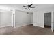 Bedroom with ceiling fan, closet, and carpet flooring at 4417 Saint Andrews Cir, Las Vegas, NV 89107