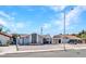 Charming single-story home featuring a low-maintenance gravel yard and covered parking at 4417 Saint Andrews Cir, Las Vegas, NV 89107
