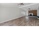 Bright living space features a fireplace, wood flooring, and large windows at 4417 Saint Andrews Cir, Las Vegas, NV 89107