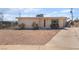 Charming single-story home featuring a low-maintenance gravel yard and a private, fenced front area at 4691 Sun Valley Cir, Las Vegas, NV 89122