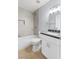 Updated bathroom with tub and shower combo, modern vanity and bright lighting at 4998 Rappahanock St, Las Vegas, NV 89122