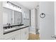 Modern bathroom features a double sink vanity and sleek fixtures at 4998 Rappahanock St, Las Vegas, NV 89122