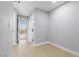 Bright hallway leading to backyard with smooth floors, recessed lighting at 4998 Rappahanock St, Las Vegas, NV 89122