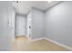 Inviting hallway with smooth floors, recessed lighting, and clean lines at 4998 Rappahanock St, Las Vegas, NV 89122