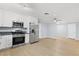 Updated kitchen featuring stainless steel appliances and an open layout at 4998 Rappahanock St, Las Vegas, NV 89122