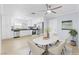Bright kitchen features stainless steel appliances and a cozy dining area at 4998 Rappahanock St, Las Vegas, NV 89122