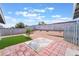 The backyard features brick and concrete patios, as well as artificial grass at 508 Van Dornum Ave, Henderson, NV 89011