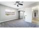 Light bedroom featuring plush carpeting, closet with mirrored sliding doors and base trim at 508 Van Dornum Ave, Henderson, NV 89011
