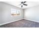 Bright, carpeted bedroom with large window, and base trim at 508 Van Dornum Ave, Henderson, NV 89011