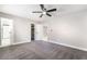 Spacious bedroom featuring plush carpeting, a ceiling fan, and neutral paint at 508 Van Dornum Ave, Henderson, NV 89011