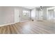 Bright living room with new floors, neutral paint, and recessed lighting at 508 Van Dornum Ave, Henderson, NV 89011