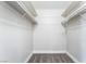 Walk-in closet with carpet, shelving, and fresh paint at 508 Van Dornum Ave, Henderson, NV 89011