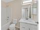 A well-lit bathroom with a shower-tub combo and single vanity at 5820 Royal Castle Ln, Las Vegas, NV 89130