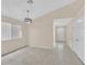 Dining area featuring decorative lighting and large windows at 5820 Royal Castle Ln, Las Vegas, NV 89130