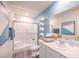 Clean bathroom features updated fixtures, shower, cabinetry and a calming color palette at 6109 Aster Garden St # 159, North Las Vegas, NV 89081