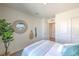 Serene bedroom with a comfortable bed and tranquil decor at 6109 Aster Garden St # 159, North Las Vegas, NV 89081