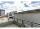 Balcony overlooking surrounding homes, landscaping, and a partly cloudy sky at 649 Tranquil Jade St, Las Vegas, NV 89138