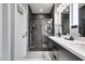 Modern bathroom featuring a double vanity with a dark finish, shower, and clean lines at 649 Tranquil Jade St, Las Vegas, NV 89138