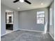 Bright bedroom featuring neutral colors, carpet and light from the window at 649 Tranquil Jade St, Las Vegas, NV 89138
