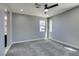 Neutral bedroom with carpet, recessed lighting, and several windows providing natural light at 649 Tranquil Jade St, Las Vegas, NV 89138