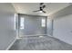 This bedroom offers neutral tones and a ceiling fan for comfortable living at 649 Tranquil Jade St, Las Vegas, NV 89138