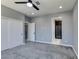 Bright bedroom with carpet flooring offers ensuite bath and closet space at 649 Tranquil Jade St, Las Vegas, NV 89138