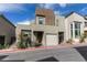 Modern house exterior with garage and complementary landscape at 649 Tranquil Jade St, Las Vegas, NV 89138