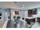 Modern kitchen featuring dark cabinets and an island with white countertop at 649 Tranquil Jade St, Las Vegas, NV 89138