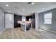 Modern kitchen with stainless appliances, island, sleek cabinets, and plenty of counter space at 649 Tranquil Jade St, Las Vegas, NV 89138